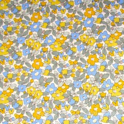 Baumwollstof Kleine gelbe und blaue Blumen | Wolf Stoffe
